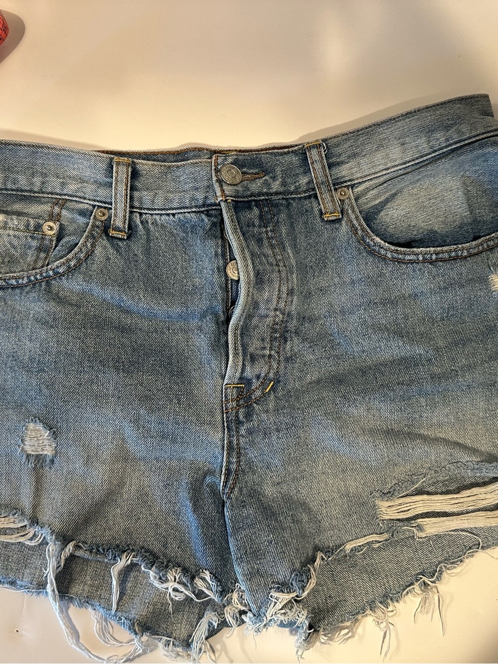 We the Free Distressed Light Blue Denim Cutoff Shorts